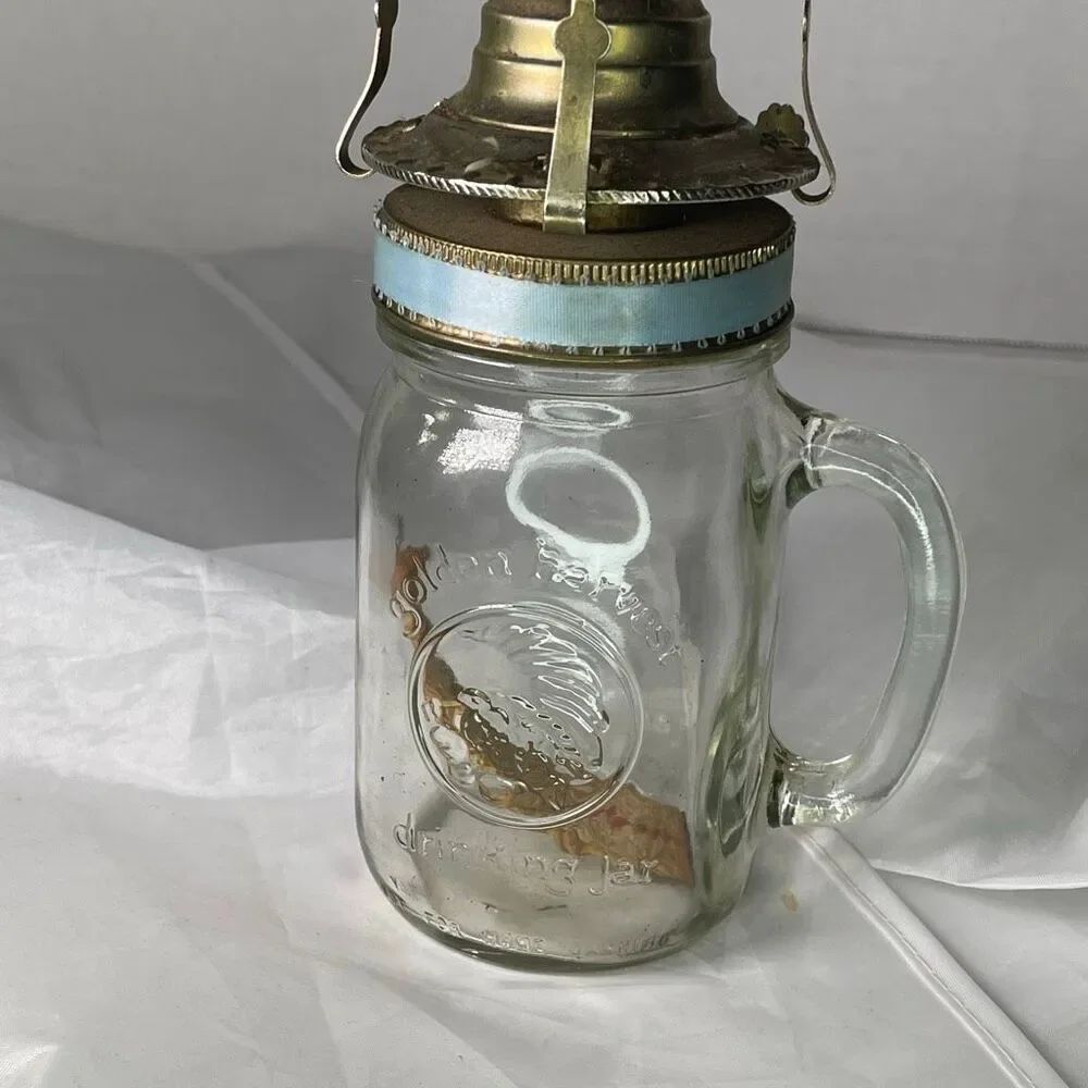 Vintage Golden Harvest drinking jar oil lamp with 2” burner. Light blue